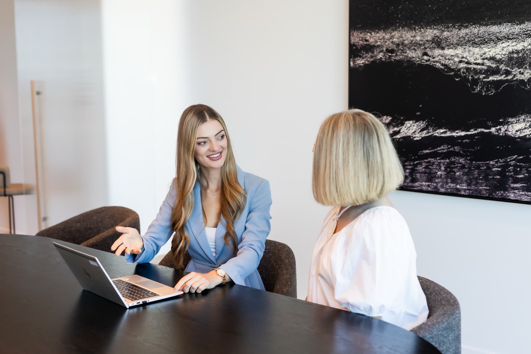 Rebecca Tickner finance broker meeting with a client