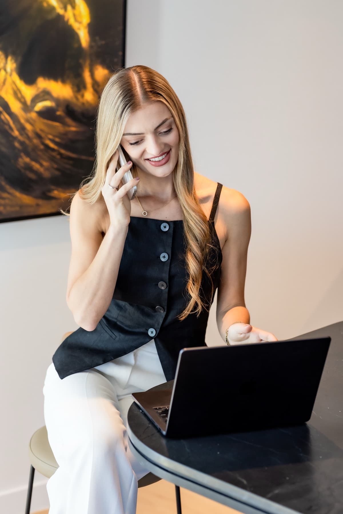 Rebecca Tickner discussing a refinance with a client