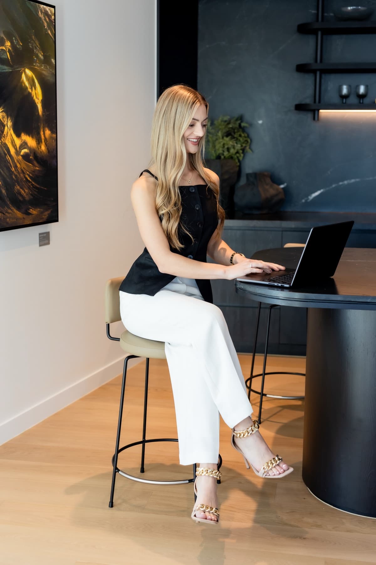 Rebecca Tickner reviewing a client's loan portfolio